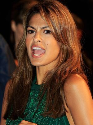 Eva Mendes in green dress at The Other Guys premiere in London